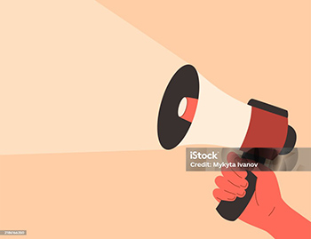 a hand holding up an alarm foghorn